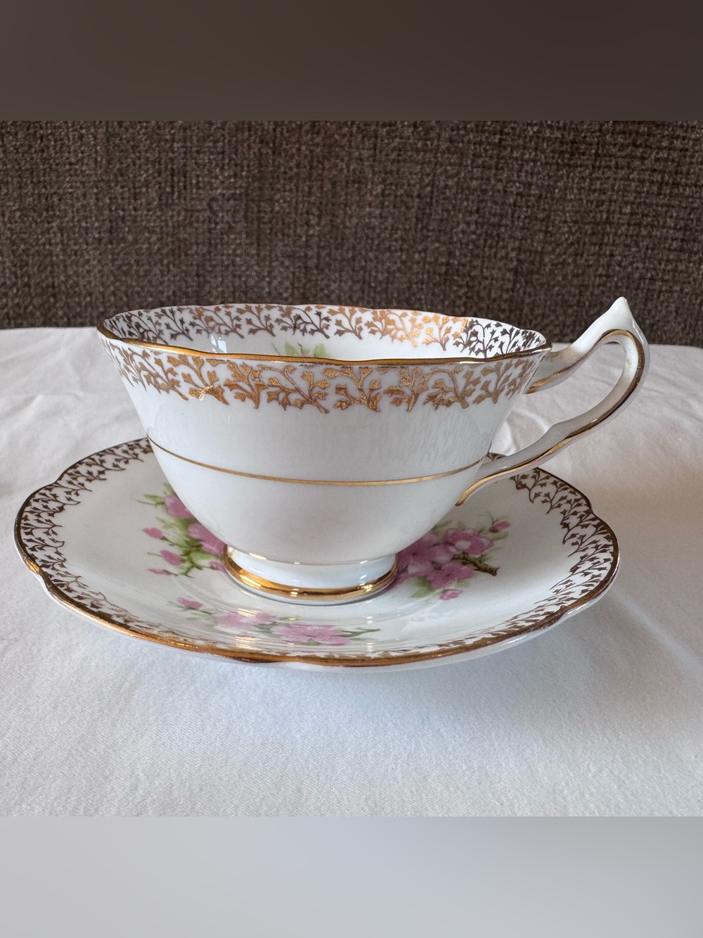 Classic White Porcelain Tea Cup & Saucer with Gold Trim and Pink Floral Accent